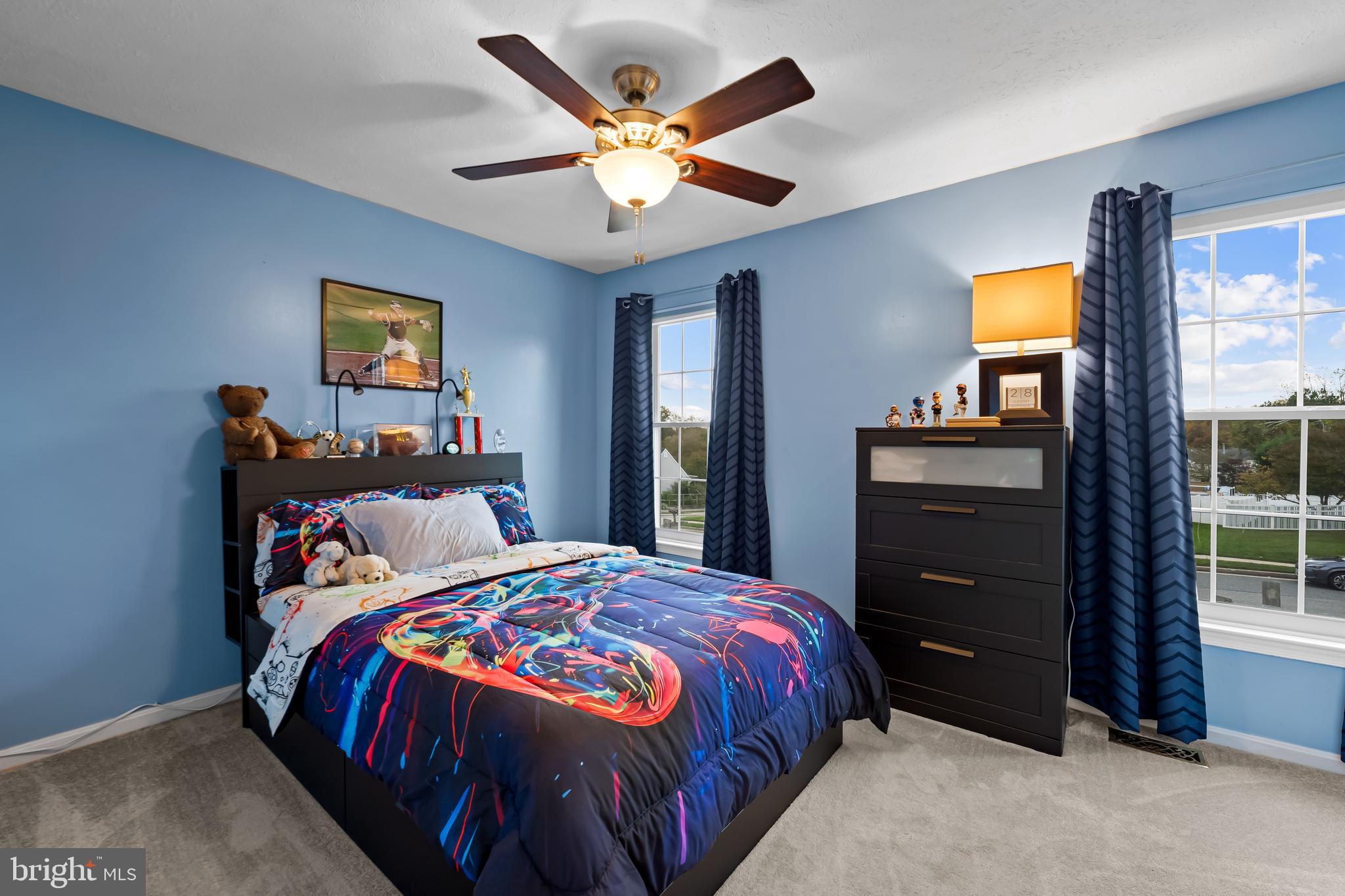 3746 Proctor Lane Nottingham, MD 21236 - Photo 26 of 36 a bedroom with a bed and a dresser