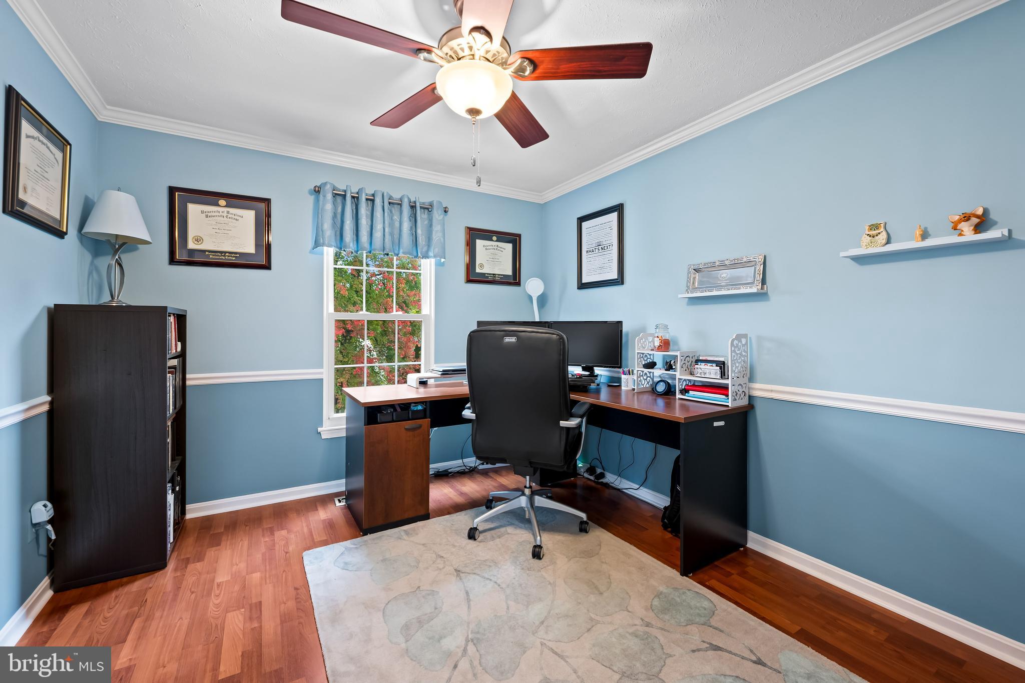 3746 Proctor Lane Nottingham, MD 21236 - Photo 9 of 36 a workspace with wooden floor and windows