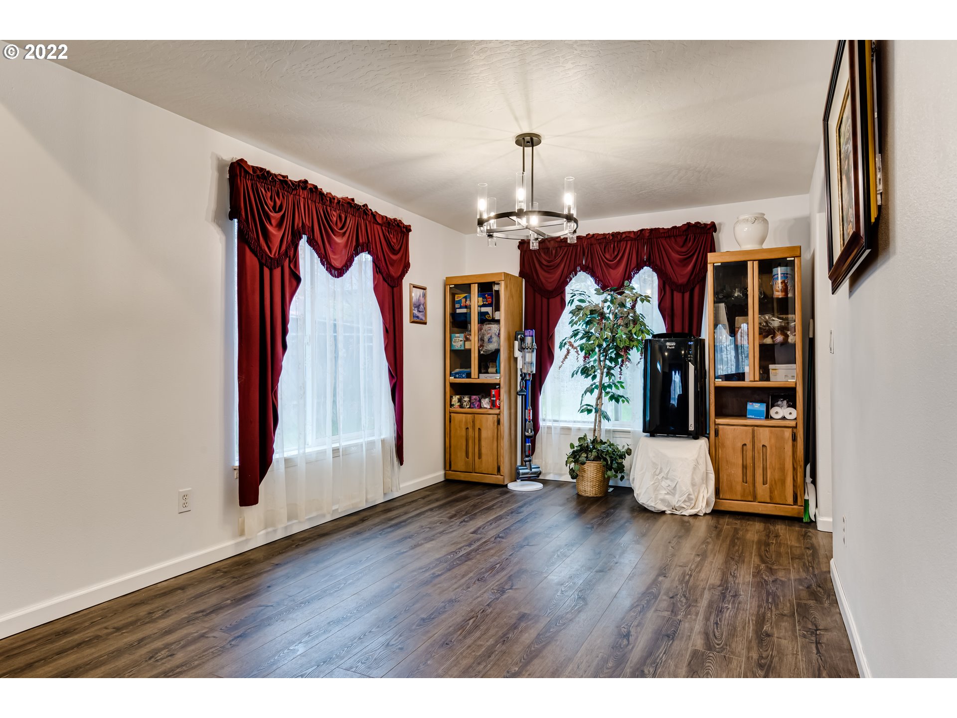 823 South 46th Street Springfield, OR 97478 - Photo 7 of 32 a view of a living room and wooden floor
