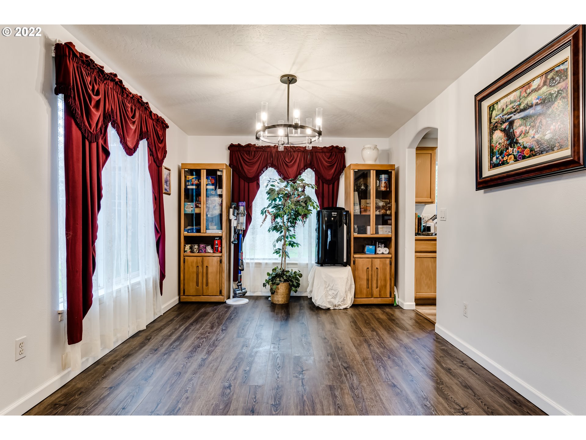823 South 46th Street Springfield, OR 97478 - Photo 8 of 32 a view of a living room and wooden floor