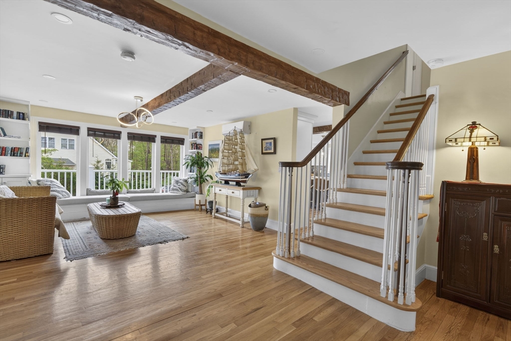 229 Parkerville Road Southborough, MA 01772 - Photo 28 of 38 a living room with furniture and a wooden floor