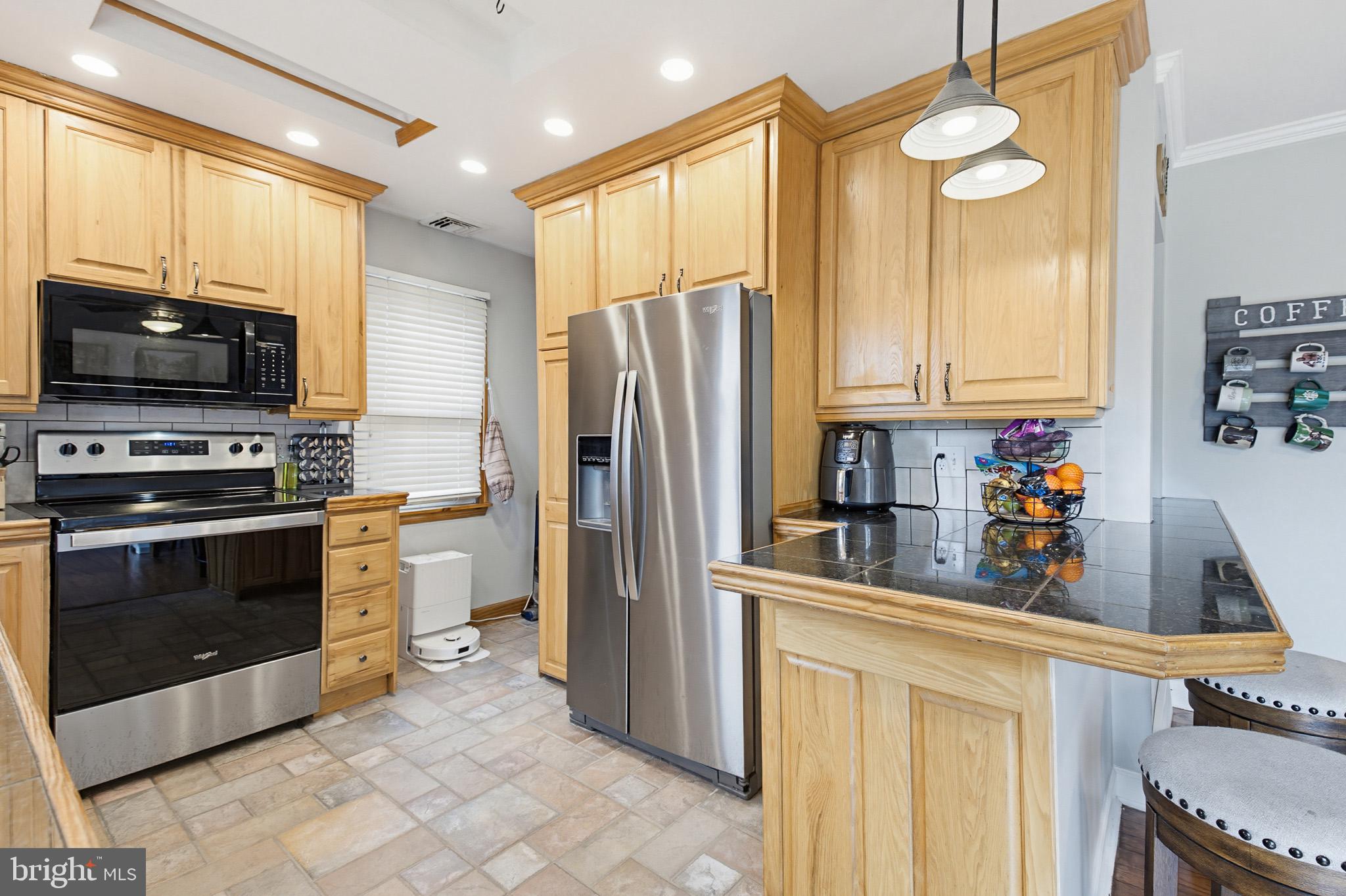 39 Rupp Street Middletown, PA 17057 - Photo 17 of 45 Modern kitchen with warm wood accents.