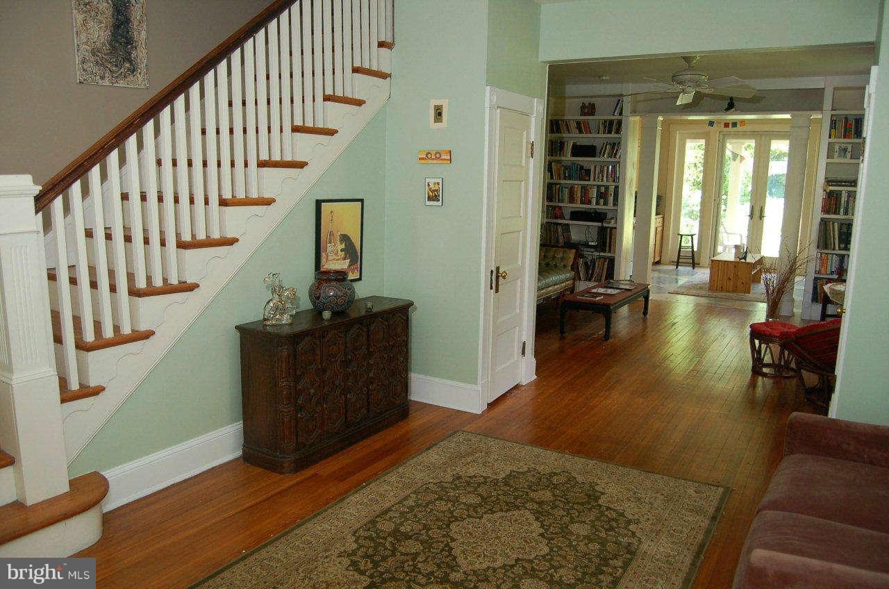 4616 Keswick Road Baltimore, MD 21210 - Photo 11 of 18 a living room with furniture and wooden floor