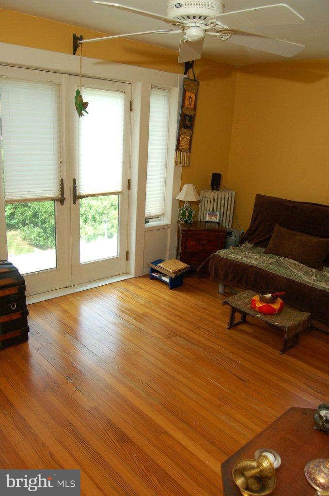 4616 Keswick Road Baltimore, MD 21210 - Photo 13 of 18 a living room with furniture and a window