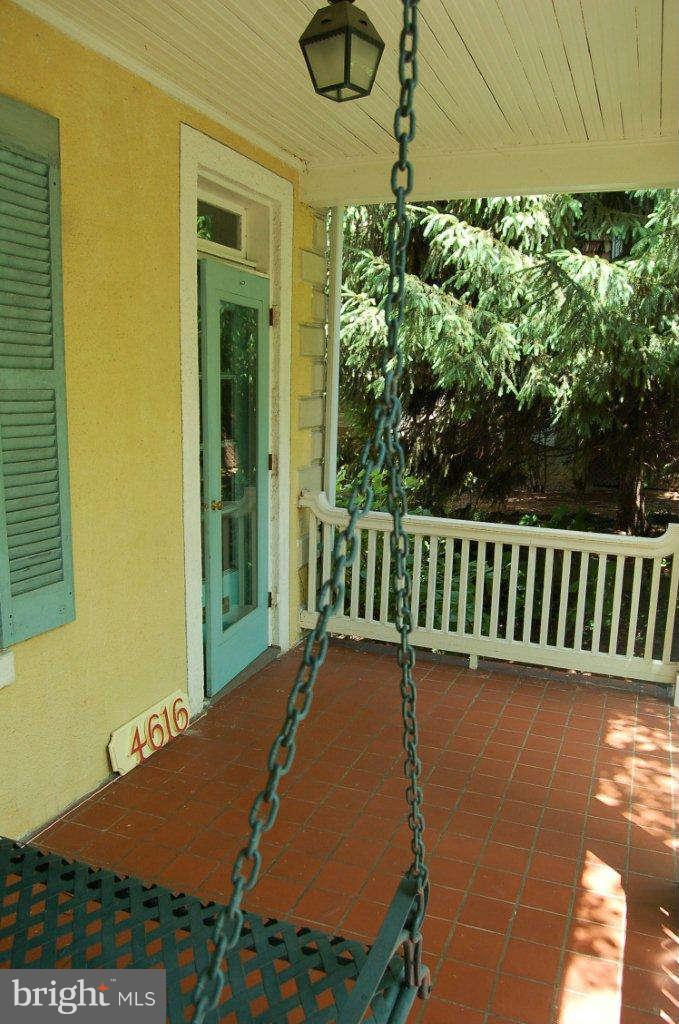 4616 Keswick Road Baltimore, MD 21210 - Photo 3 of 18 a view of balcony with wooden floor