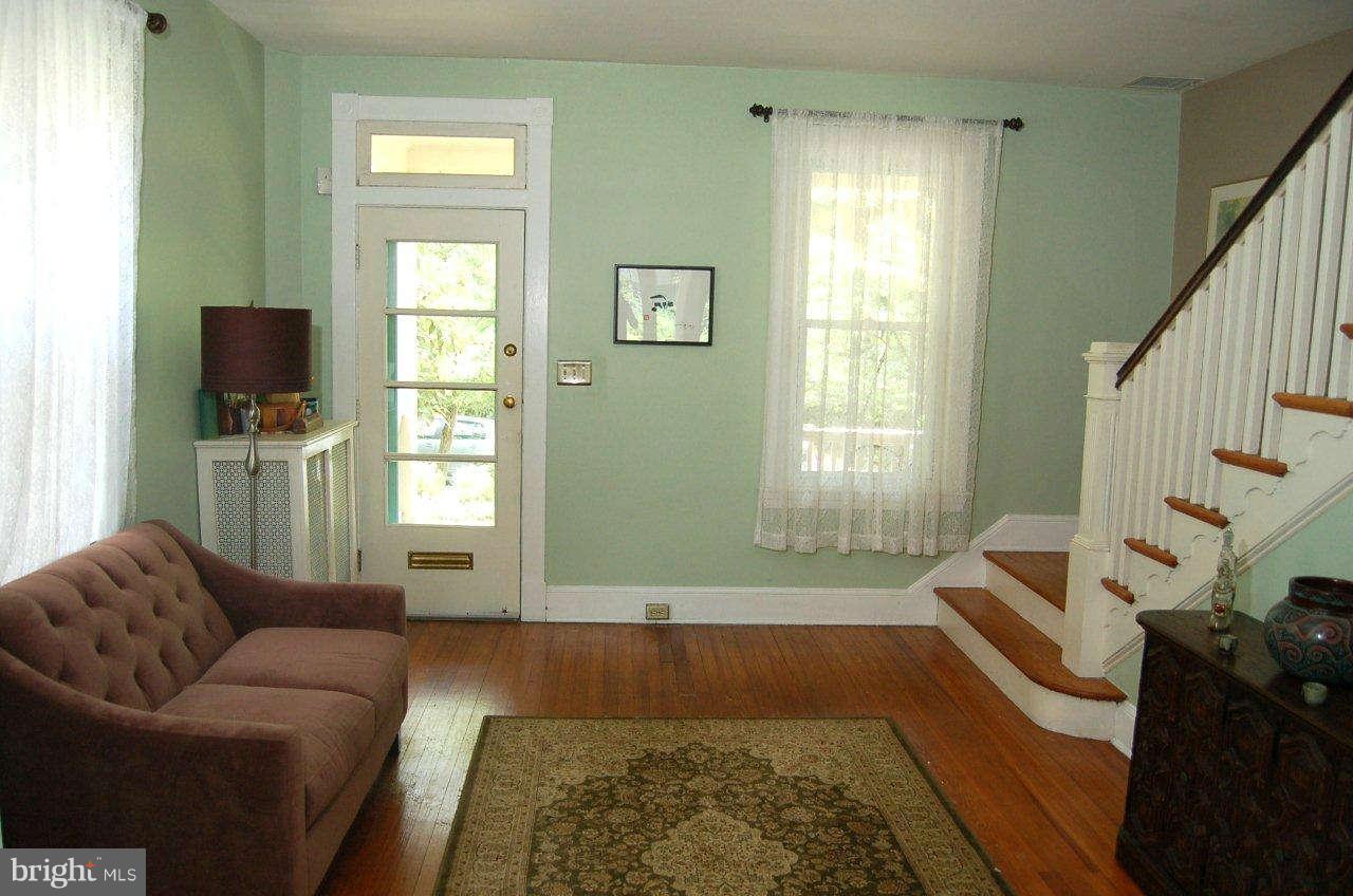 4616 Keswick Road Baltimore, MD 21210 - Photo 10 of 18 a living room with furniture and a window