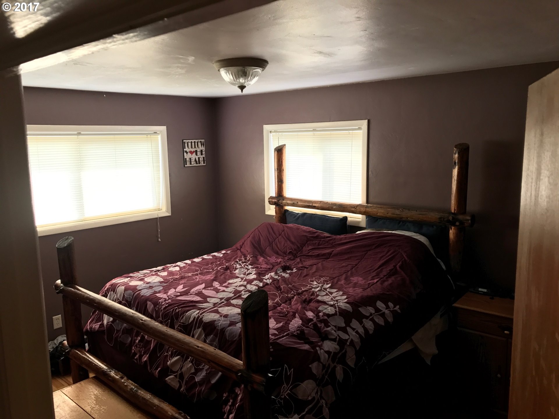 927 54th Place Springfield, OR 97478 - Photo 20 of 26 a bedroom with a bed and window