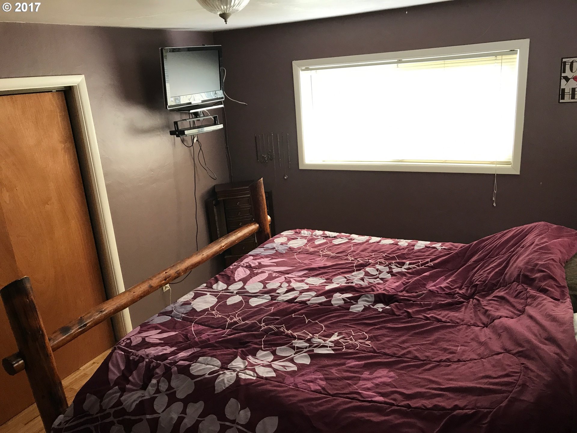 927 54th Place Springfield, OR 97478 - Photo 22 of 26 a bedroom with a bed and a window