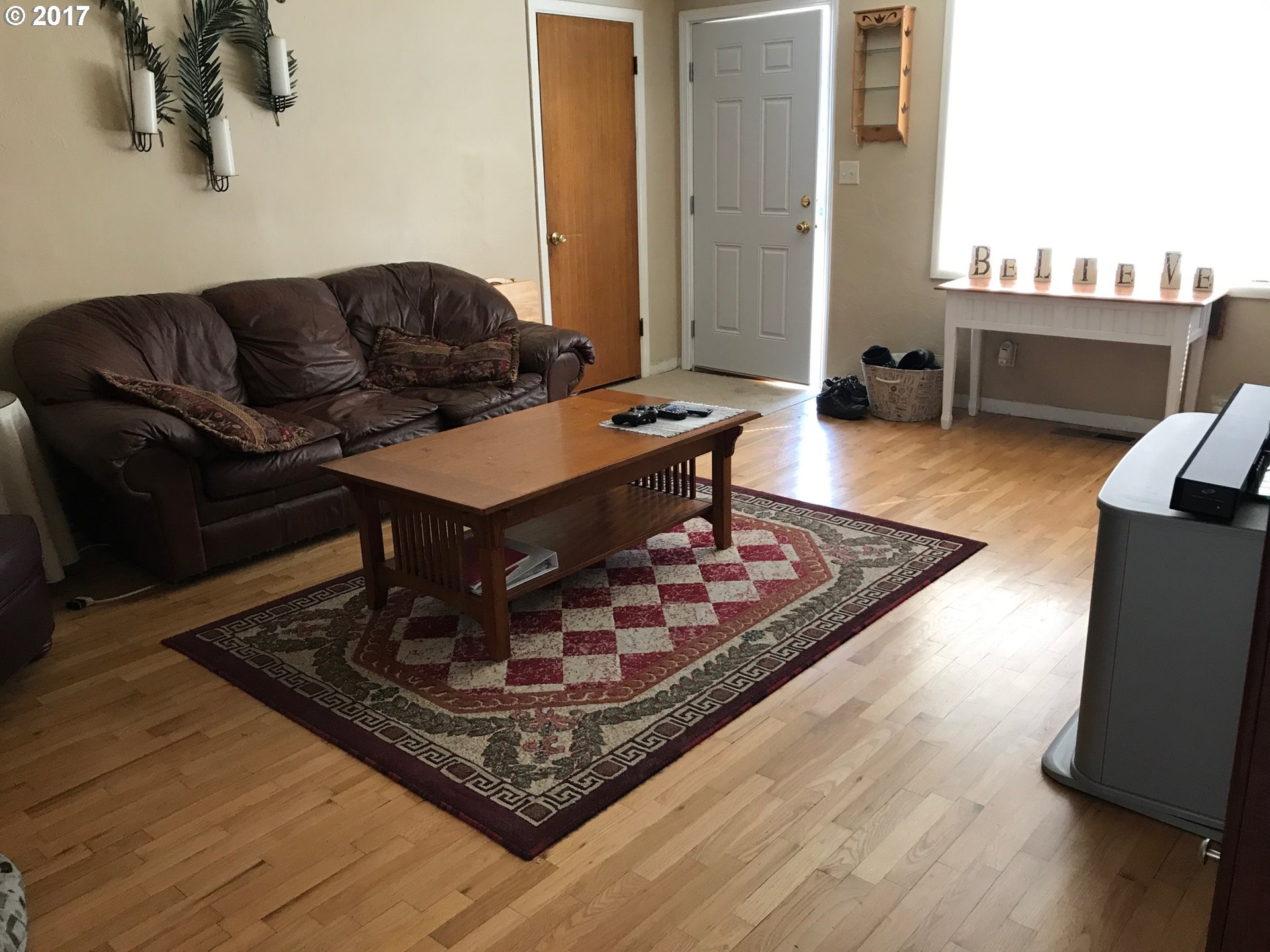 927 54th Place Springfield, OR 97478 - Photo 25 of 26 a living room with furniture and a rug