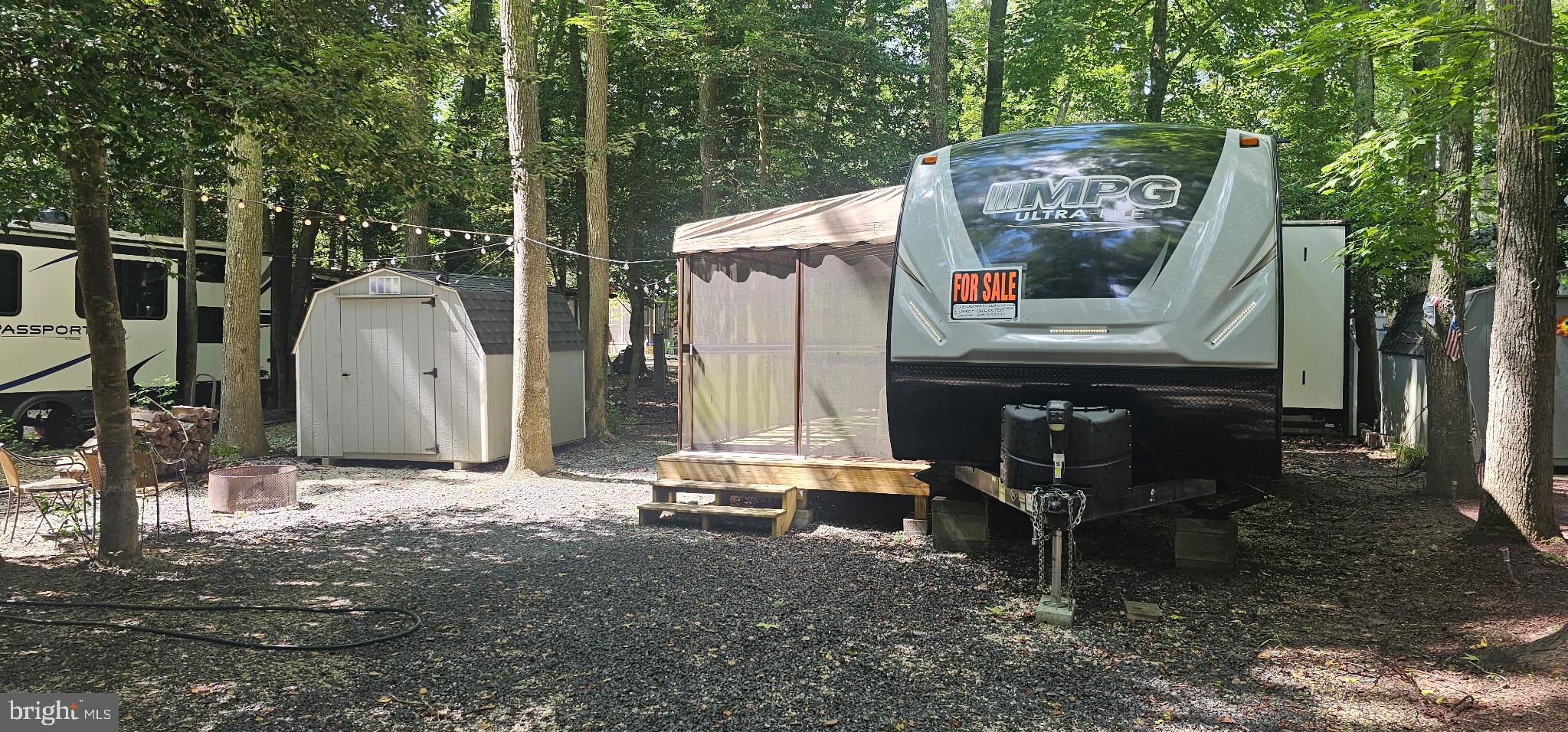 669 Route 9 Rte Cape, Unit 439 Cape May, NJ 08204 - Photo 14 of 18 a view of a two chairs in a backyard