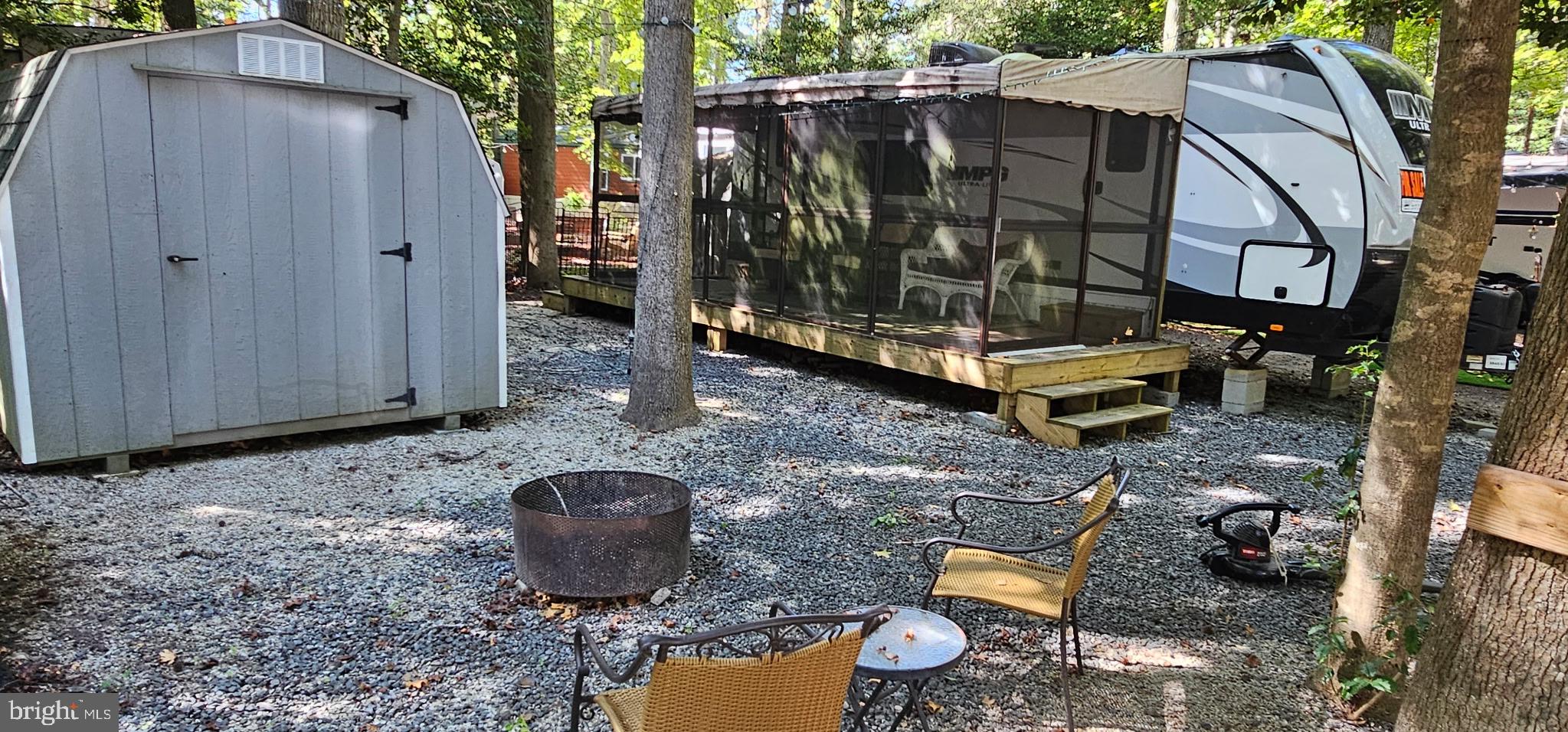 669 Route 9 Rte Cape, Unit 439 Cape May, NJ 08204 - Photo 15 of 18 a backyard of a house with barbeque oven