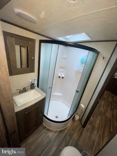 669 Route 9 Rte Cape, Unit 439 Cape May, NJ 08204 - Photo 10 of 18 a bathroom with a sink and mirror