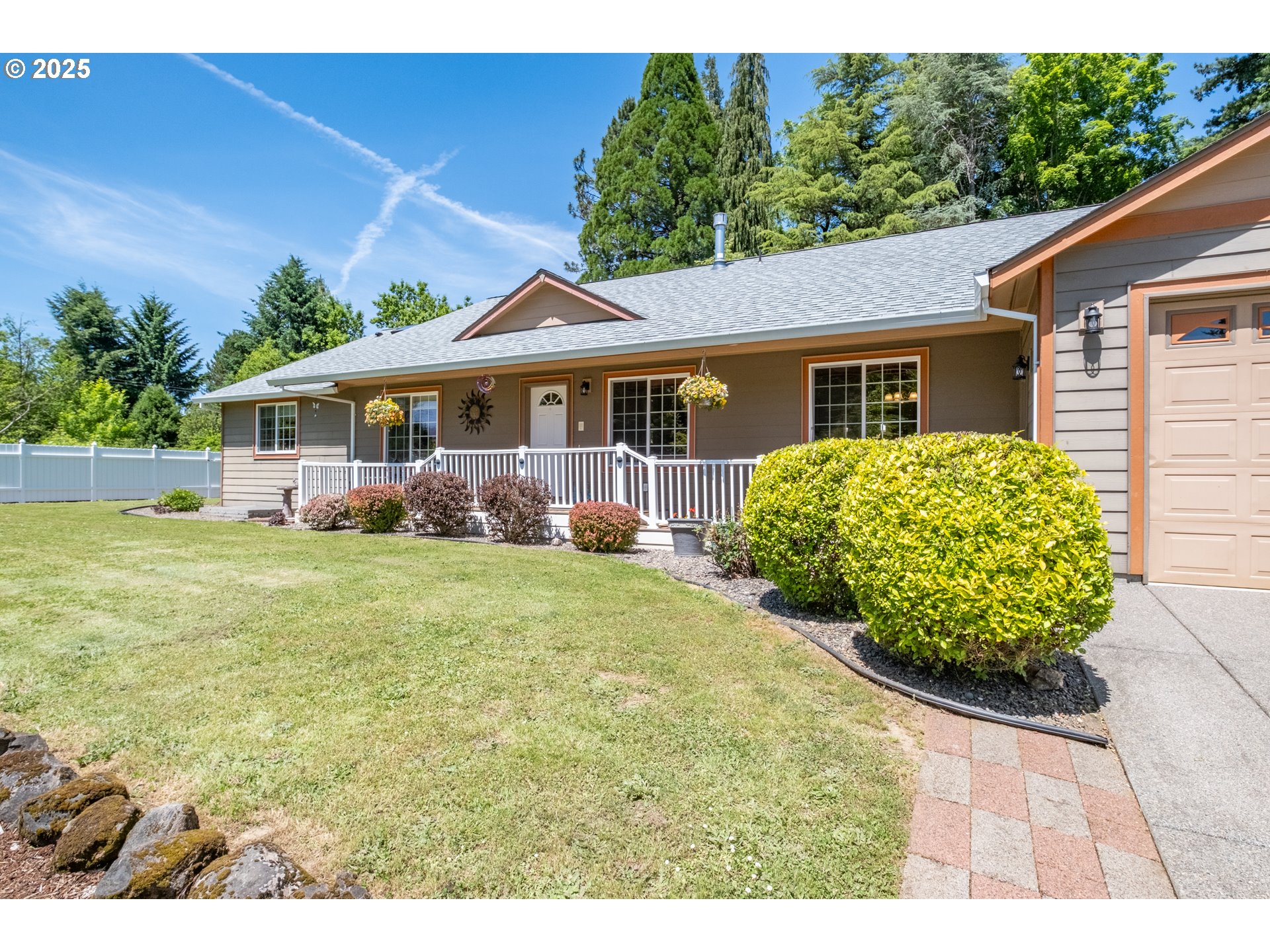 58348 Ross Road Warren, OR 97053 - Photo 1 of 27 a front view of a house with garden