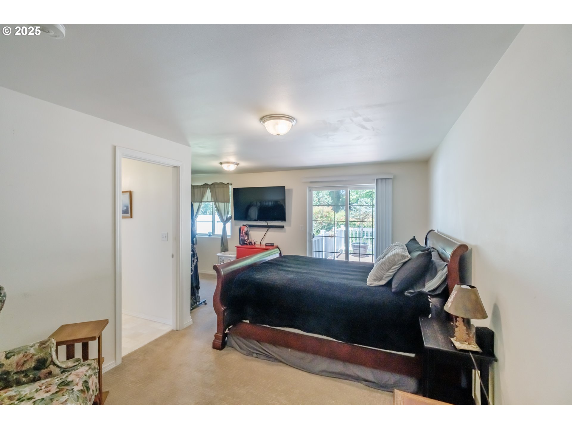 58348 Ross Road Warren, OR 97053 - Photo 15 of 27 a bedroom with a bed and a window