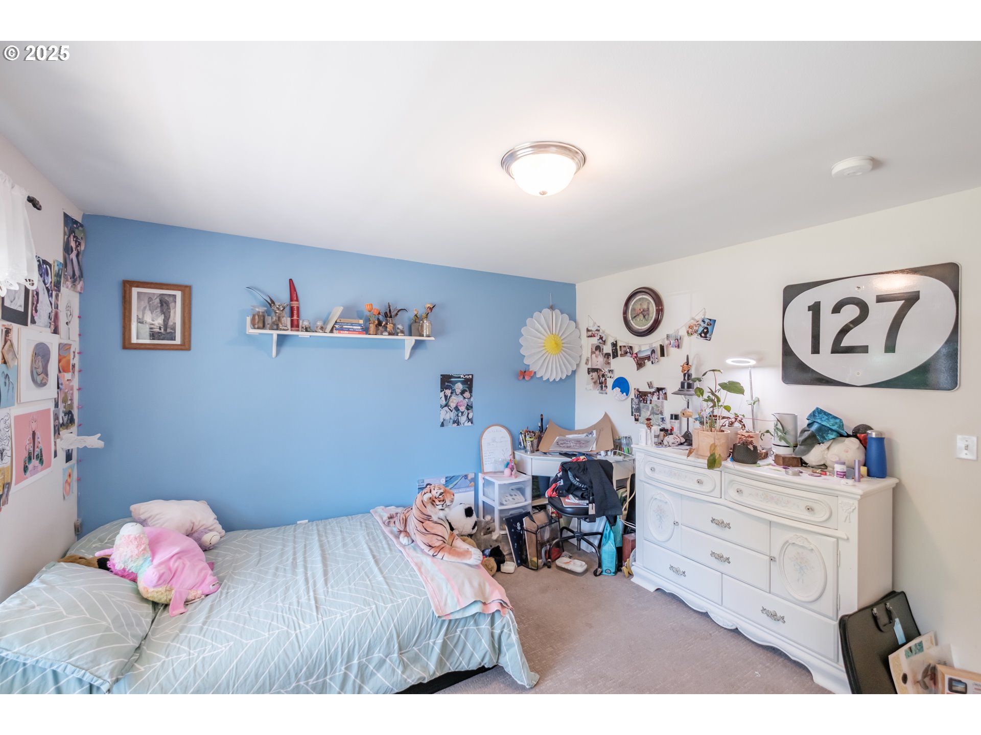 58348 Ross Road Warren, OR 97053 - Photo 17 of 27 a bedroom with a bed and furniture