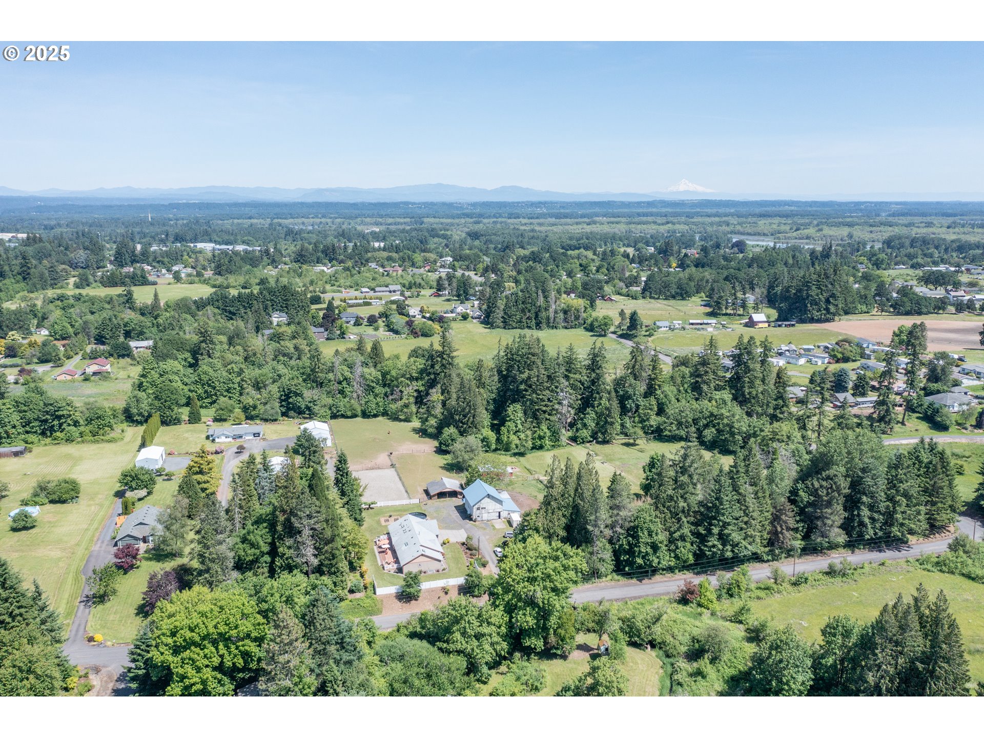 58348 Ross Road Warren, OR 97053 - Photo 19 of 27 an aerial view of residential building and trees around