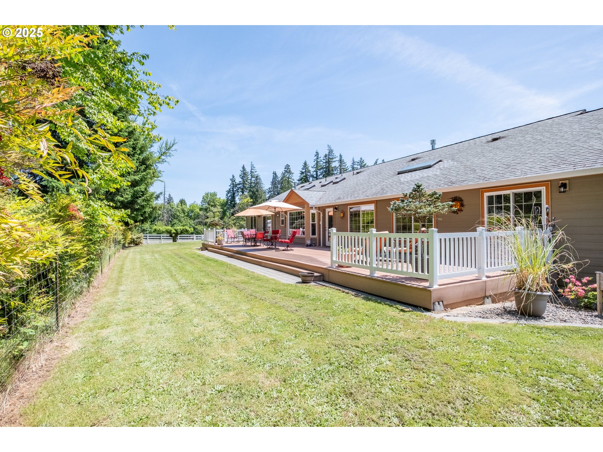 58348 Ross Road Warren, OR 97053 - Photo 2 of 27 a view of a house with a yard balcony and sitting area