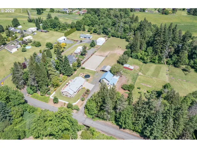 an aerial view of residential house with outdoor space