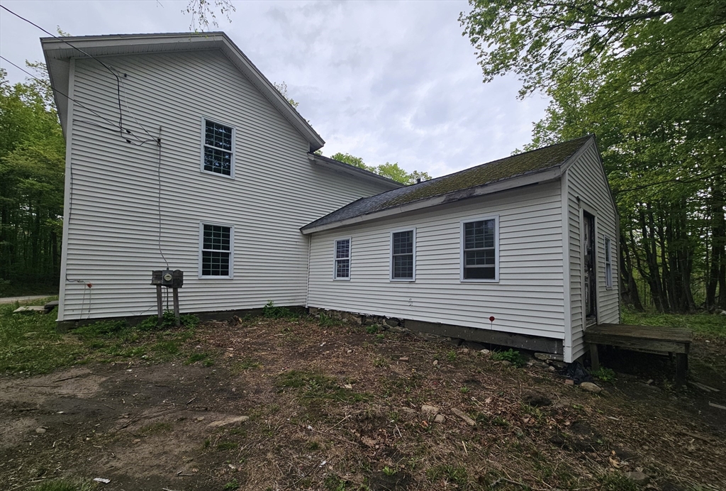 1 Crane Road Chester, MA 01011 - Photo 3 of 12 a house with a yard
