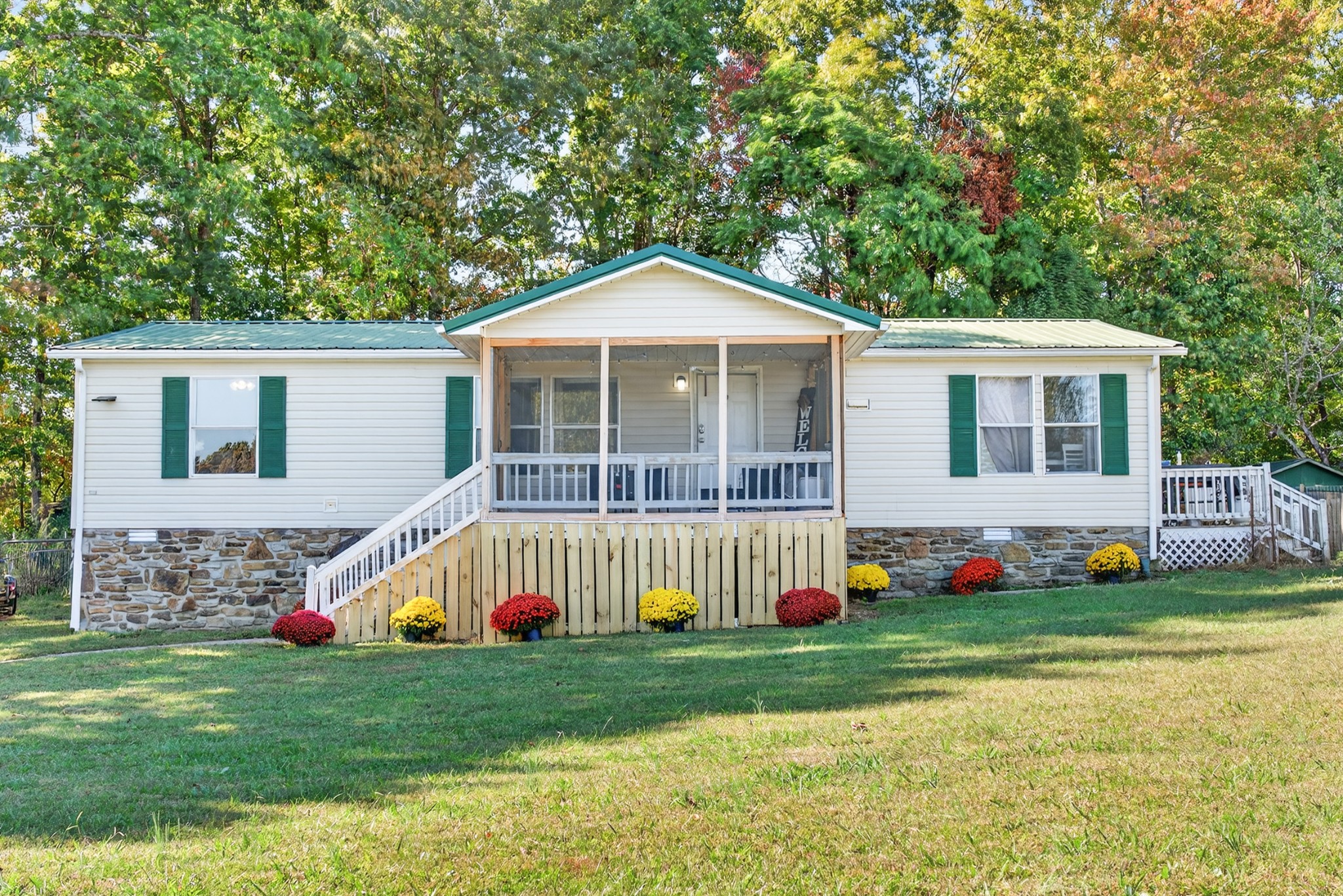 634 Pointe Lane Lafayette, TN 37083 - Photo 1 of 51 a view of an house with backyard and entertaining space