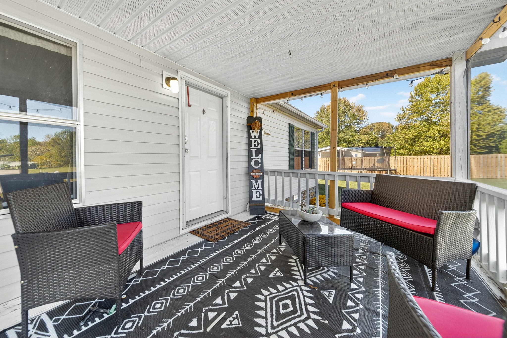 634 Pointe Lane Lafayette, TN 37083 - Photo 12 of 51 a balcony with chairs and wooden floor