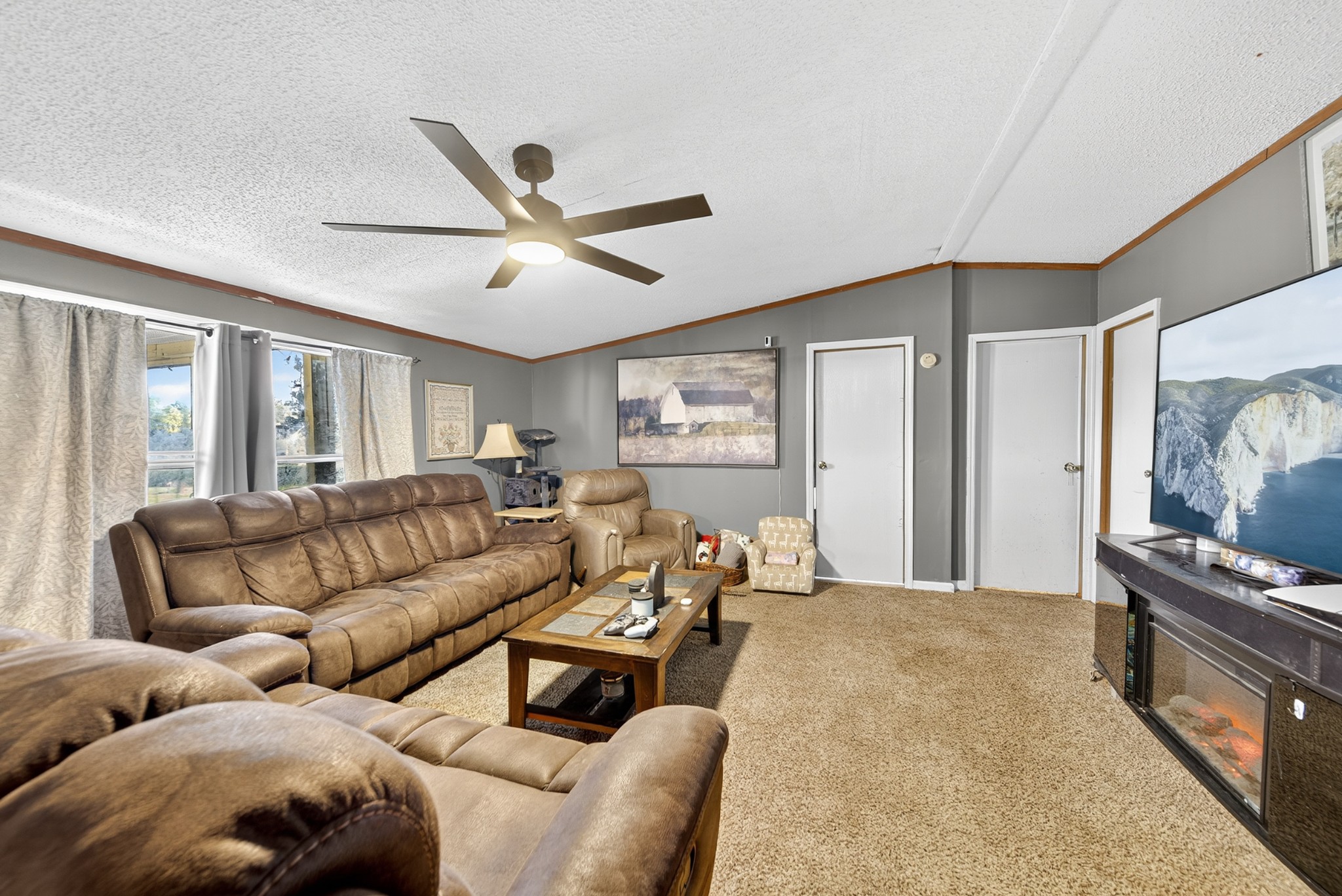 634 Pointe Lane Lafayette, TN 37083 - Photo 14 of 51 a living room with furniture and a window