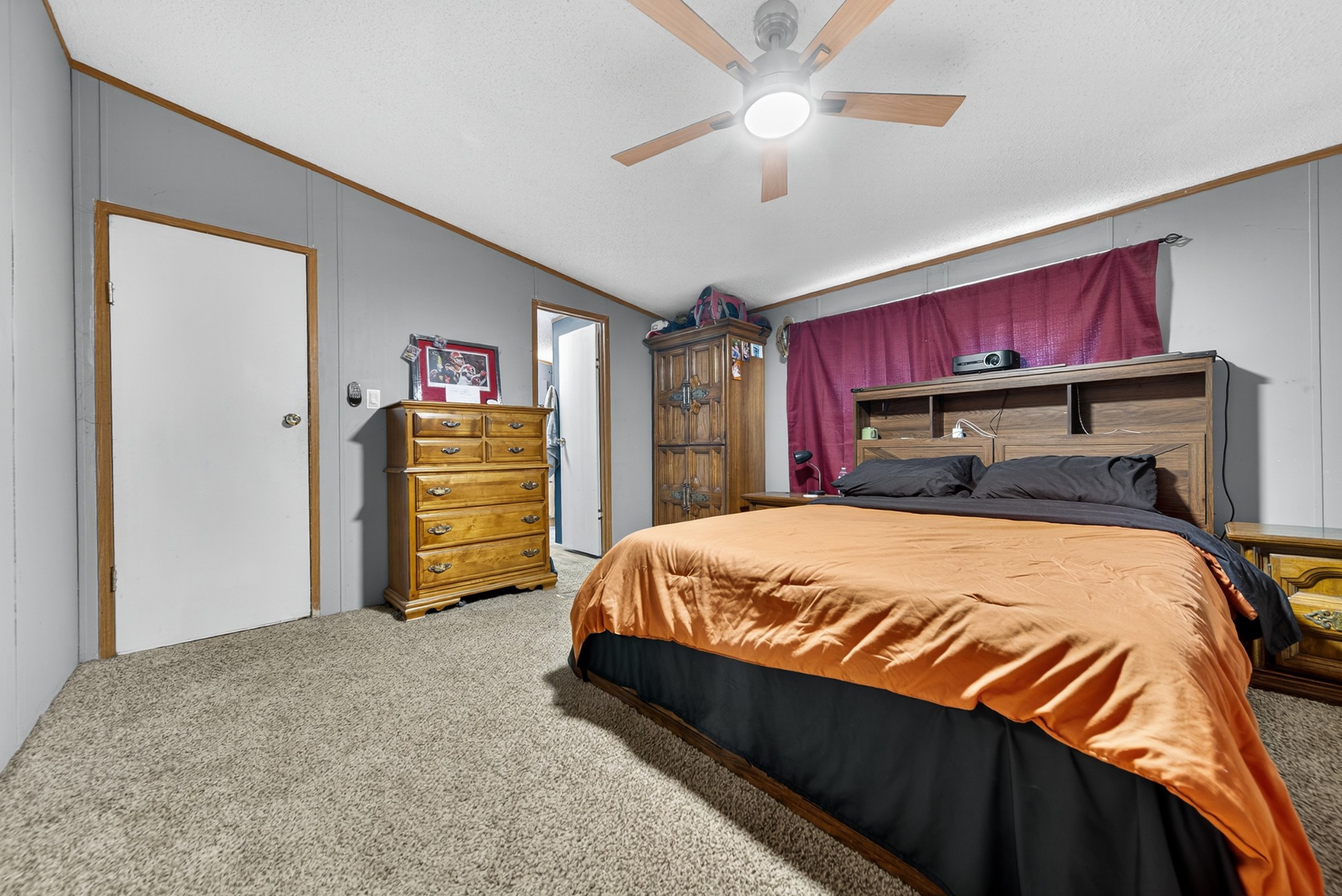 634 Pointe Lane Lafayette, TN 37083 - Photo 26 of 51 a bed sitting in a bedroom next to a window