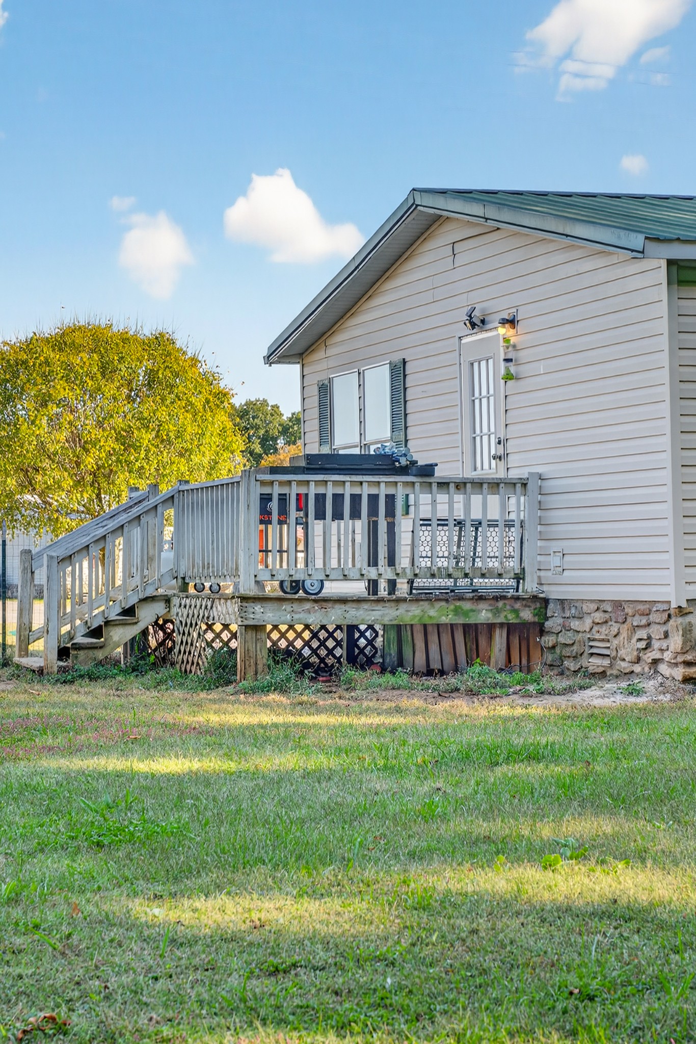 634 Pointe Lane Lafayette, TN 37083 - Photo 32 of 51 a view of a house with a yard and sitting area
