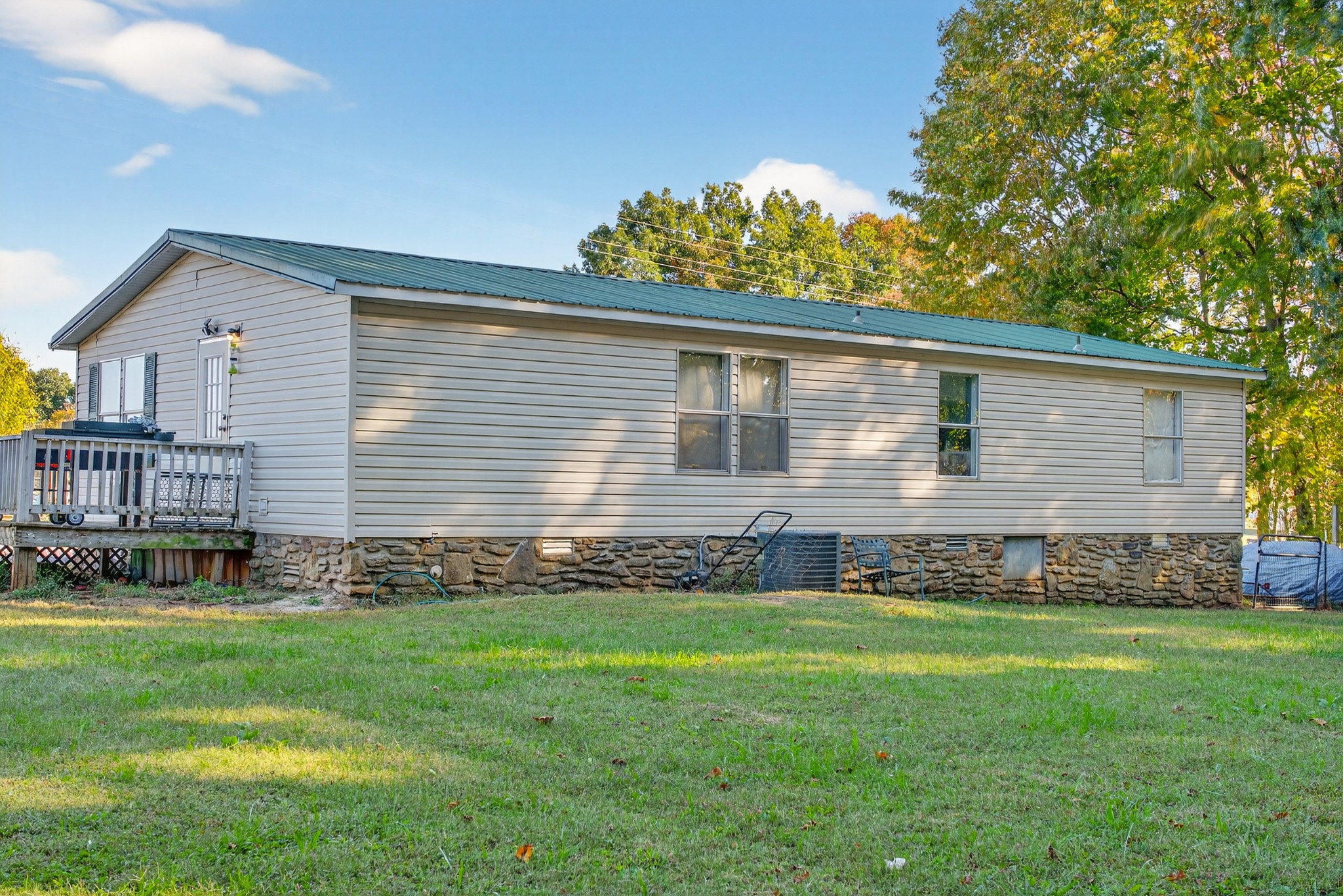 634 Pointe Lane Lafayette, TN 37083 - Photo 36 of 51 a front view of a house with a yard and garage