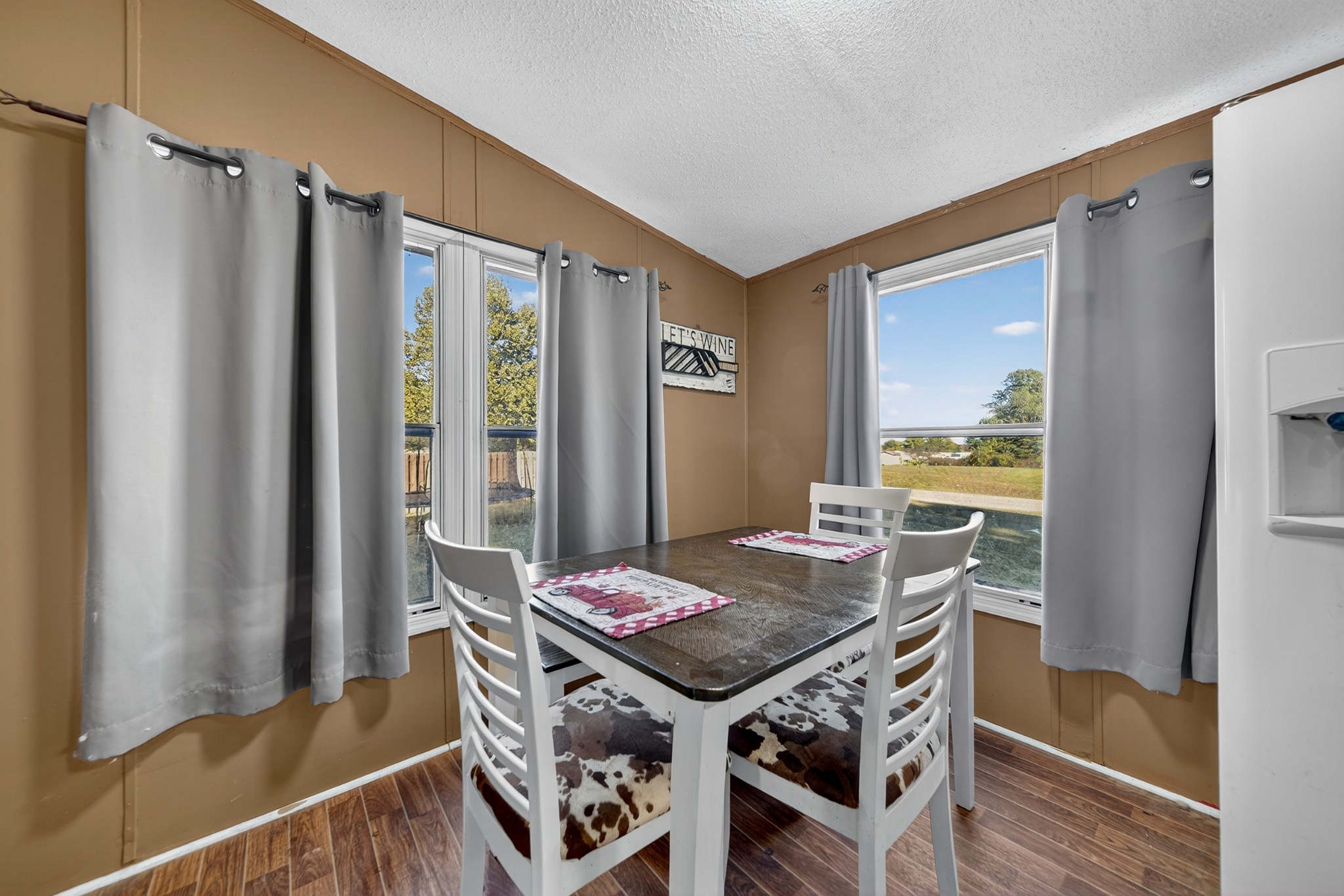 634 Pointe Lane Lafayette, TN 37083 - Photo 44 of 51 a view of a dining room with furniture window and wooden floor