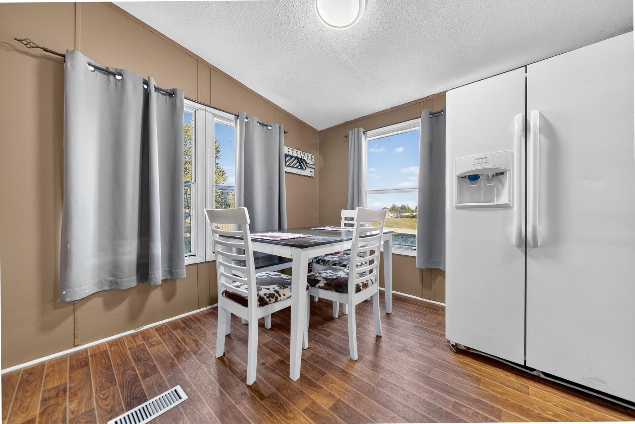 634 Pointe Lane Lafayette, TN 37083 - Photo 45 of 51 a dining room with furniture window and wooden floor