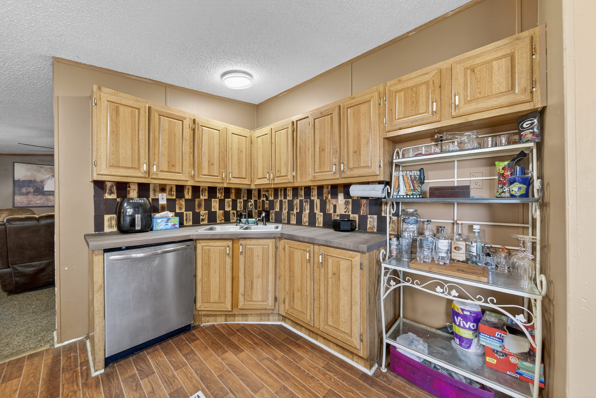 634 Pointe Lane Lafayette, TN 37083 - Photo 51 of 51 a kitchen with stainless steel appliances granite countertop a refrigerator and cabinets