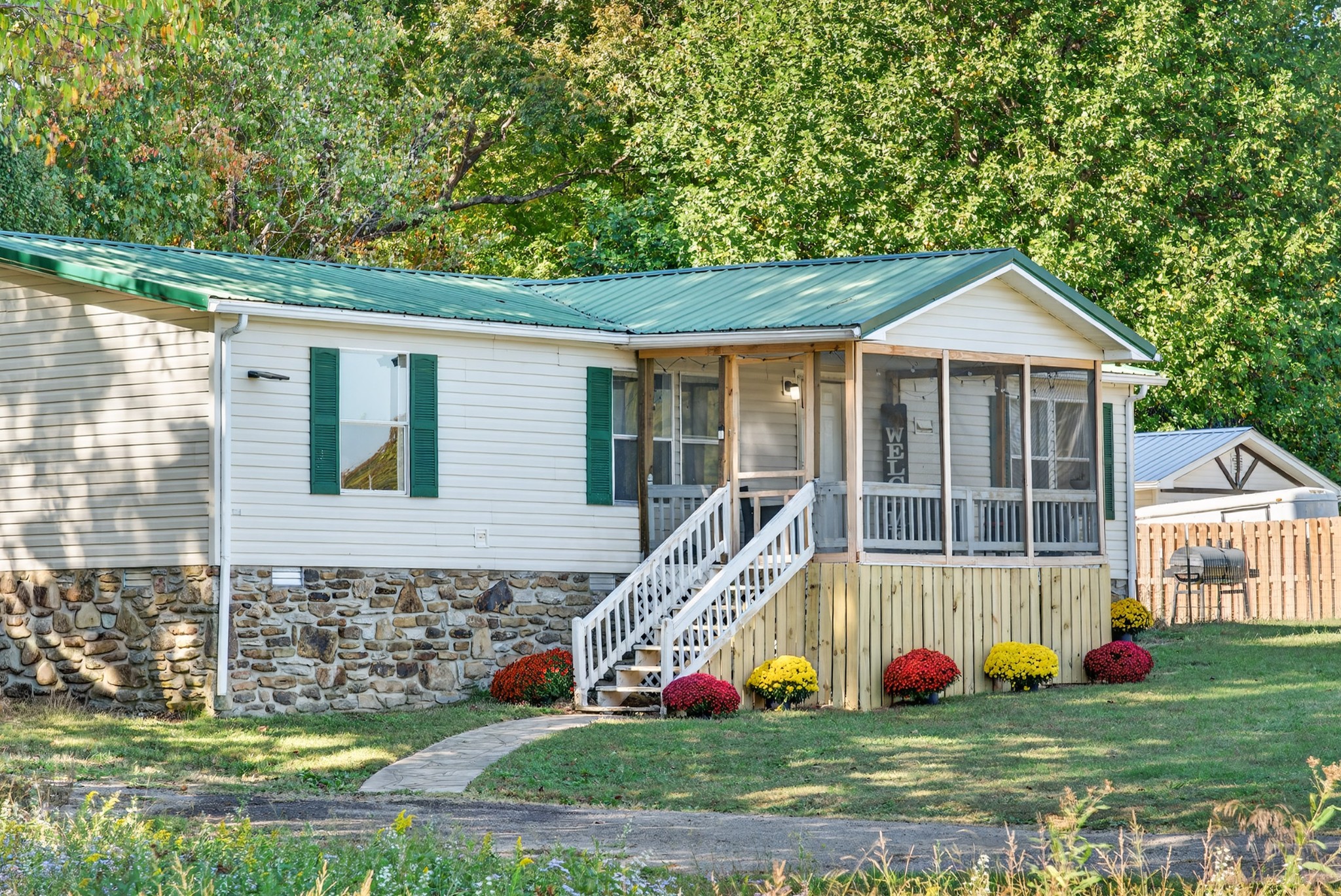 634 Pointe Lane Lafayette, TN 37083 - Photo 6 of 51 a front view of house with yard and swimming pool