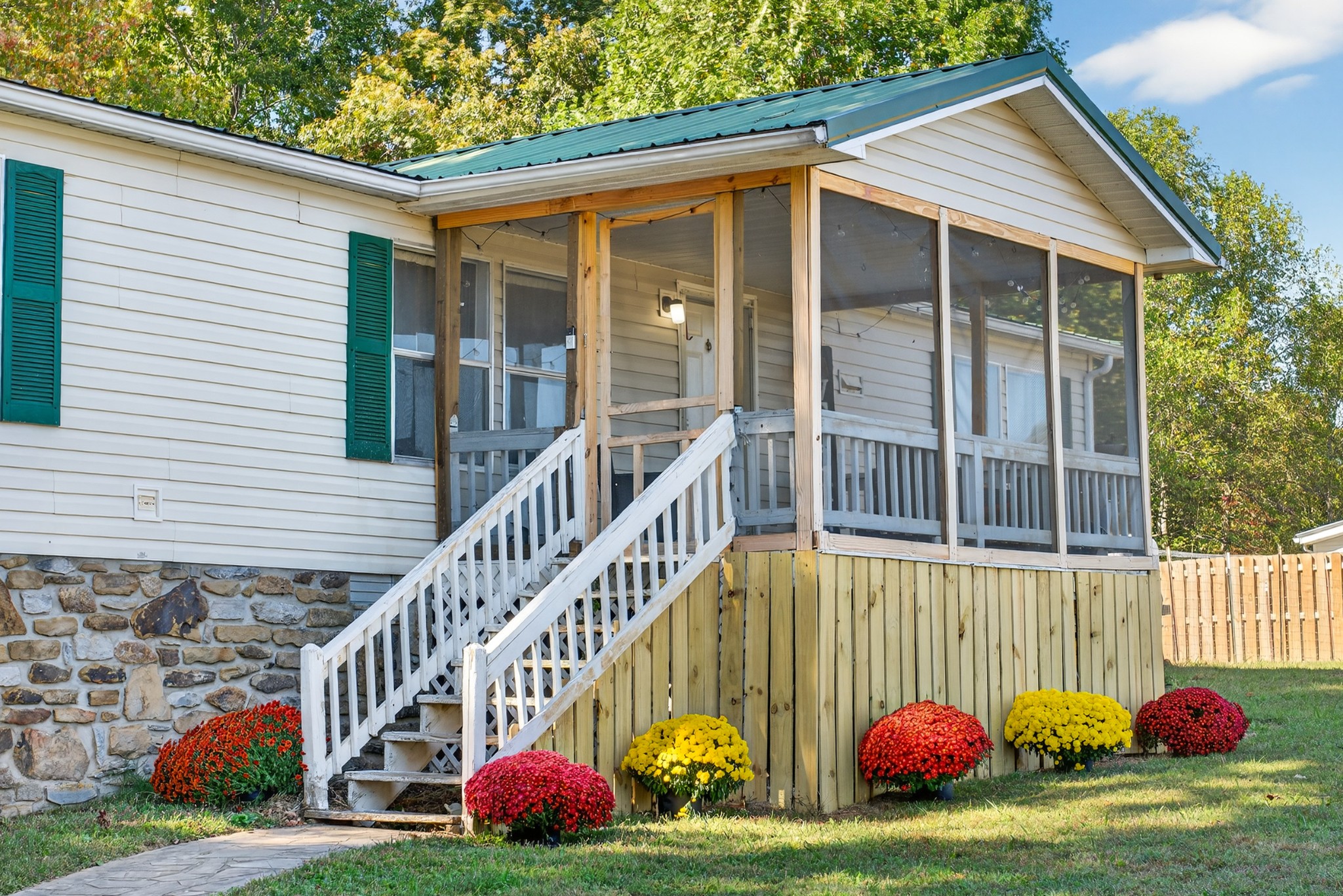 634 Pointe Lane Lafayette, TN 37083 - Photo 7 of 51 a view of a house with a yard and plants