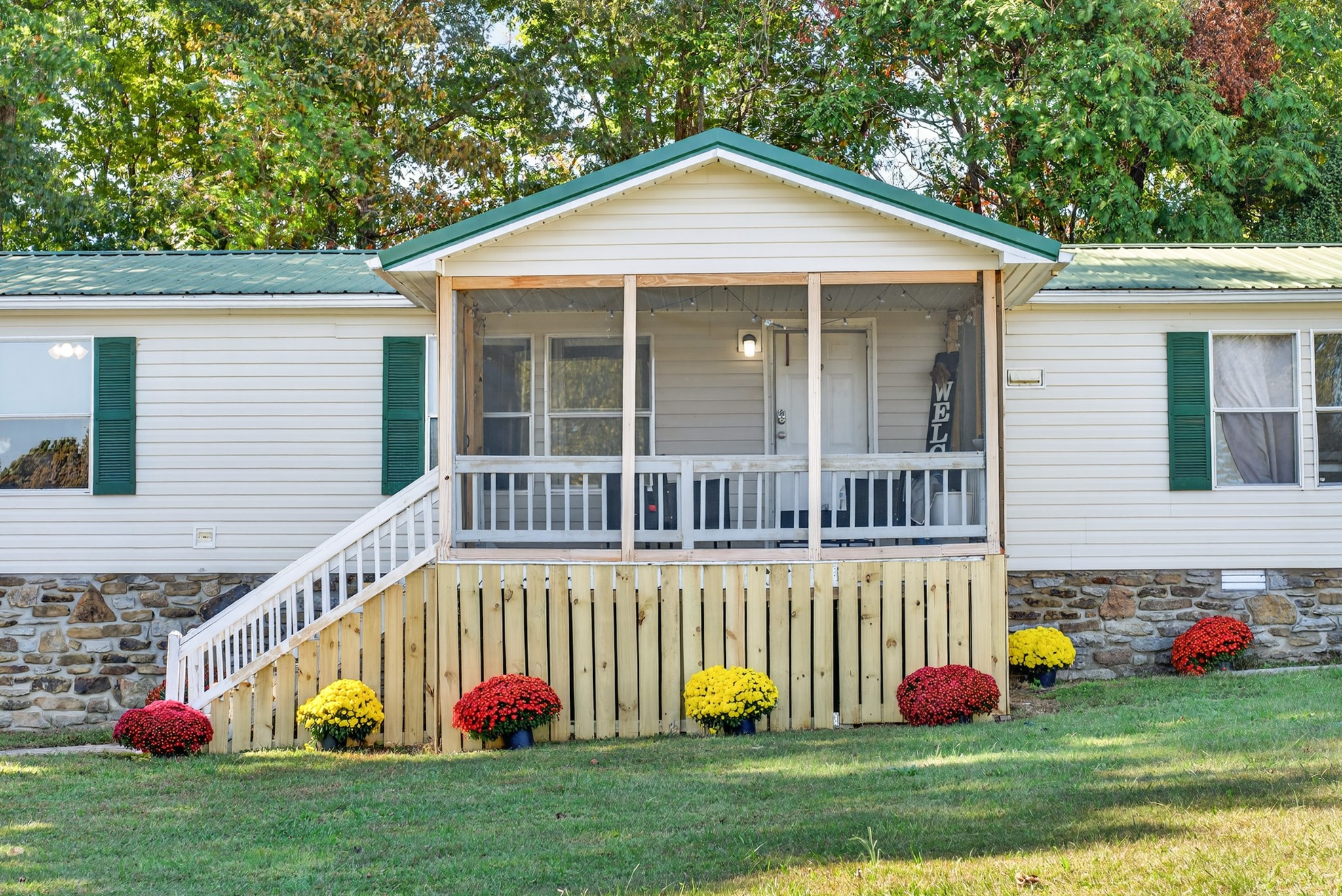 634 Pointe Lane Lafayette, TN 37083 - Photo 8 of 51 a view of a house with a yard and plants
