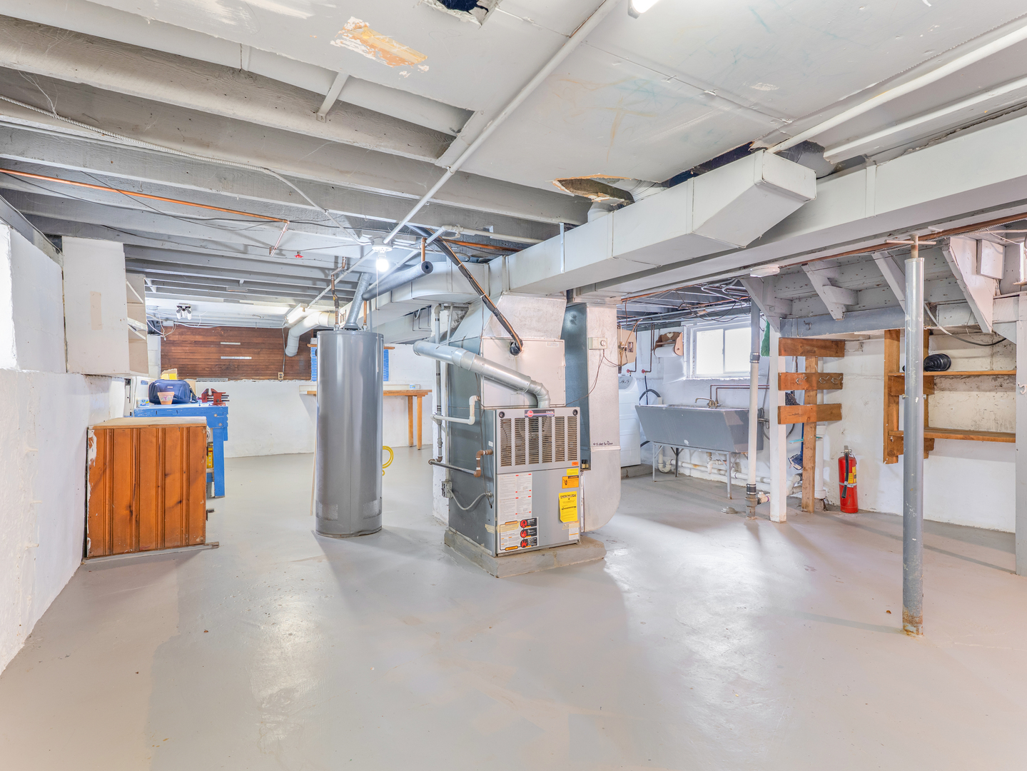 3439 West 66th Place Chicago, IL 60629 - Photo 23 of 31 a view of a room with wooden walls