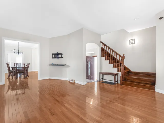 a view of a livingroom with furniture and wooden floor