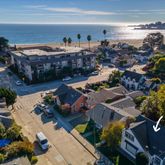 an aerial view of a house with outdoor space