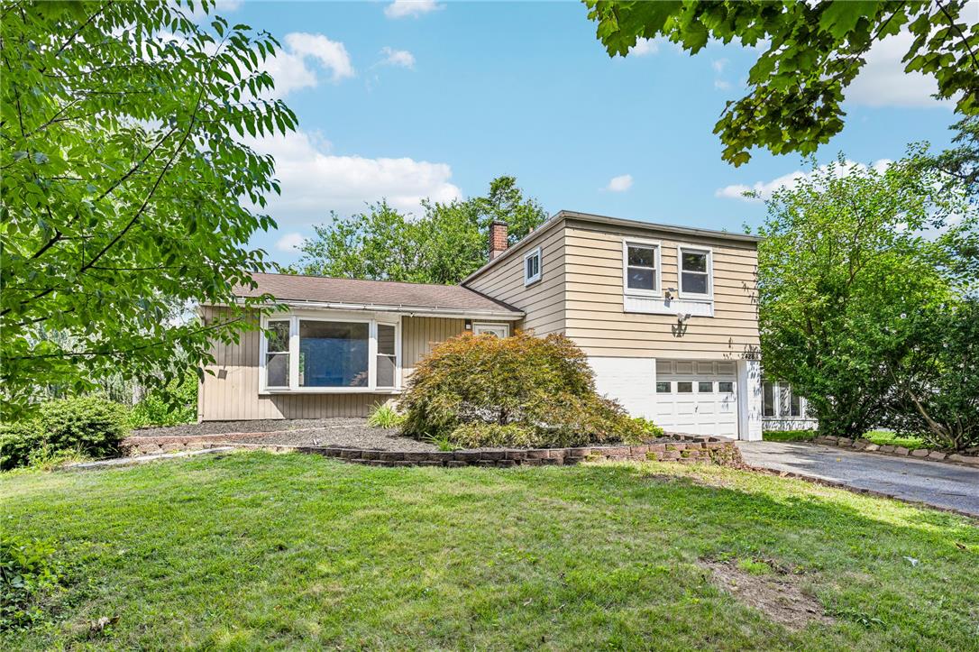 2428 Nottingham Road Bethlehem, PA 18017 - Photo 1 of 48 A split-level residence with bay window and an attached garage offers appealing curb appeal.