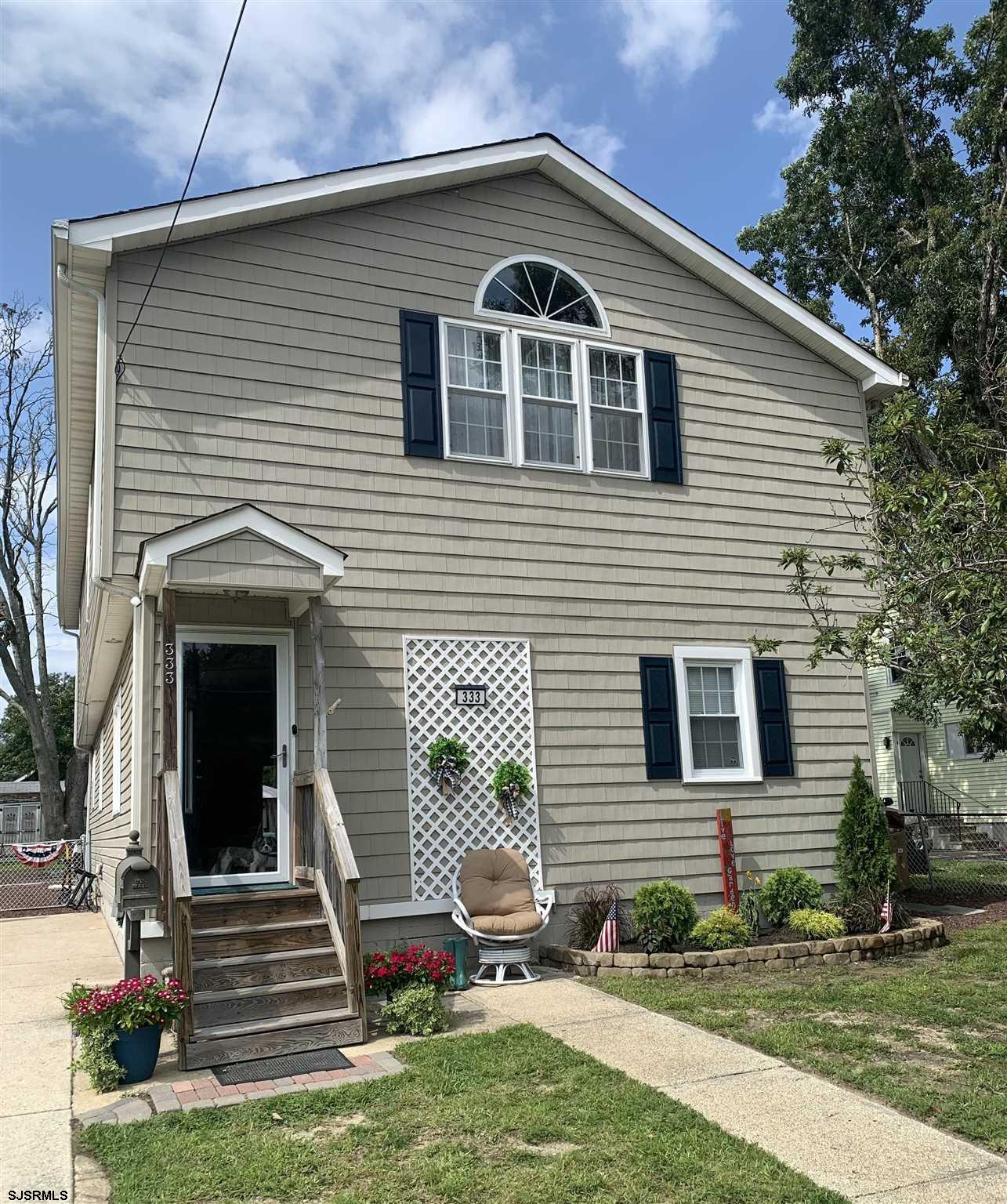 333 Shore Road Somers Point, NJ 08244 - Photo 1 of 25 a front view of a house with garden