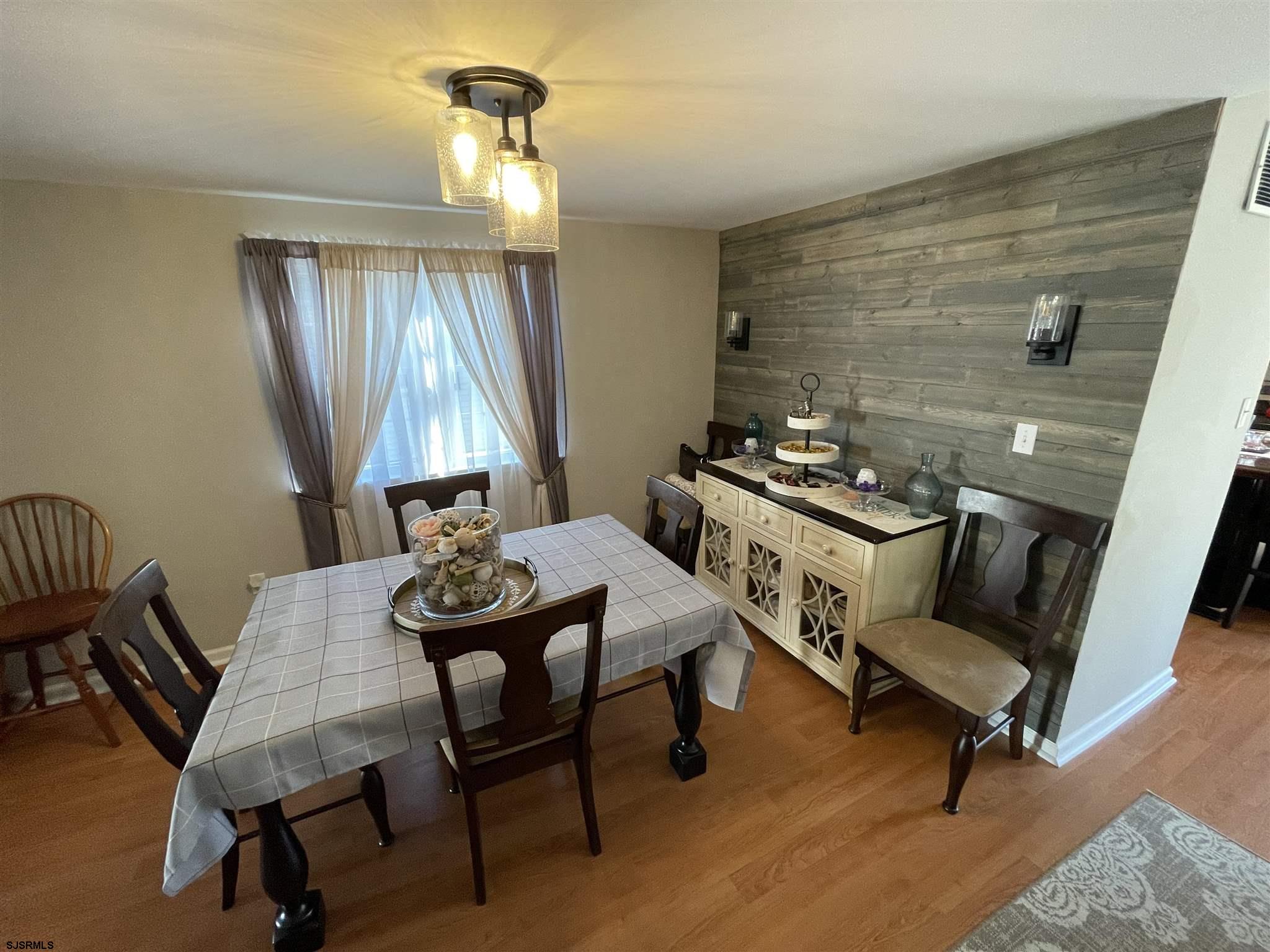 333 Shore Road Somers Point, NJ 08244 - Photo 3 of 25 a room with furniture and window