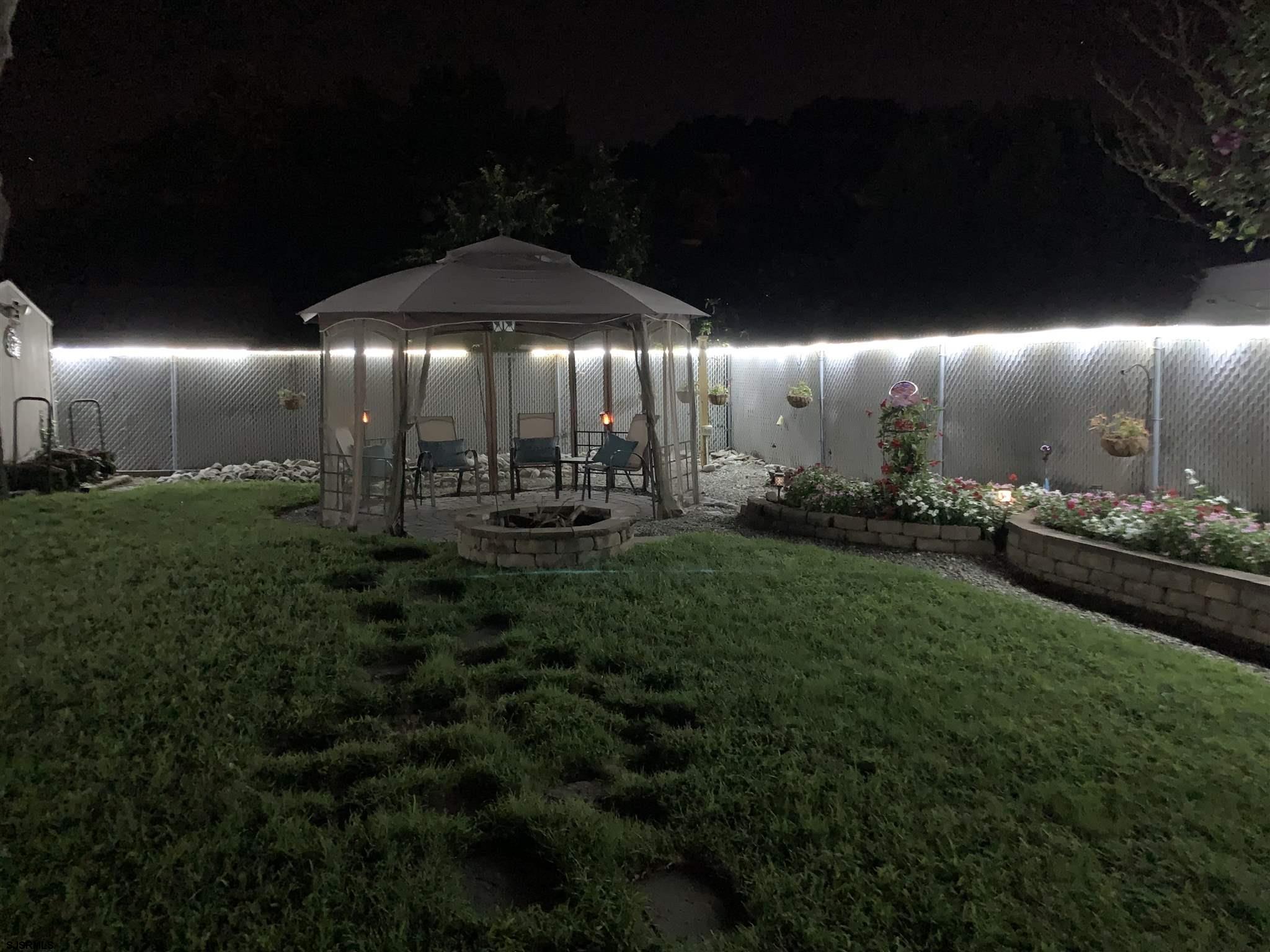 333 Shore Road Somers Point, NJ 08244 - Photo 23 of 25 a large room with lots of green space