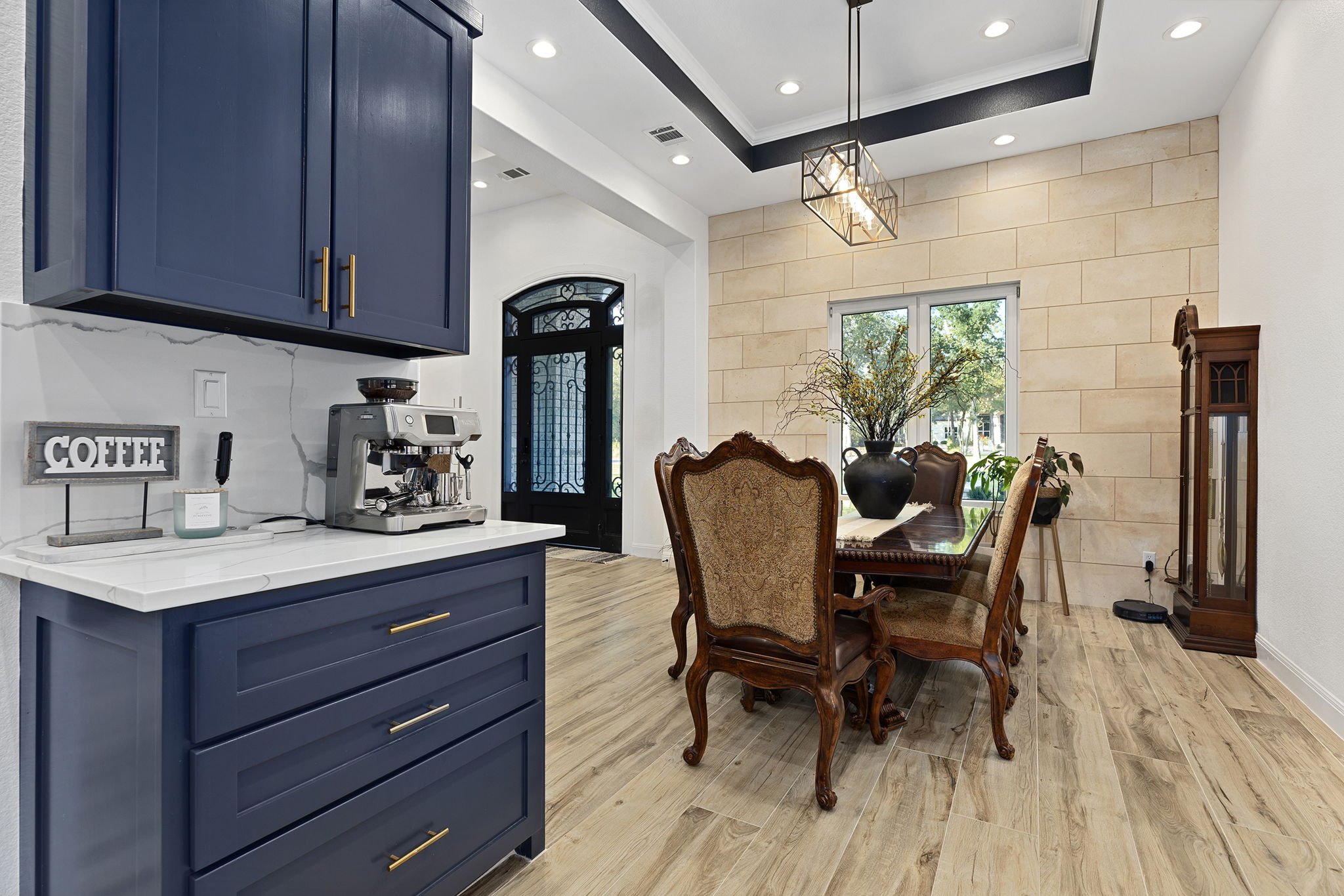 153 Fawn Hollow Elgin, TX 78621 - Photo 14 of 40 a view of a dining room with furniture and wooden floor