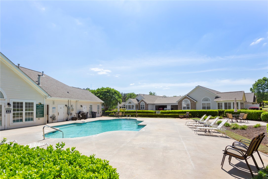 155 Life Style Lane Anderson, SC 29621 - Photo 42 of 49 This inviting outdoor pool area offers a refreshing oasis for relaxation and recreation.