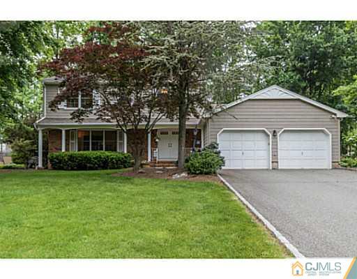 14 Fox Hill Road Edison, NJ 08820 - Photo 1 of 22 a front view of a house with a yard