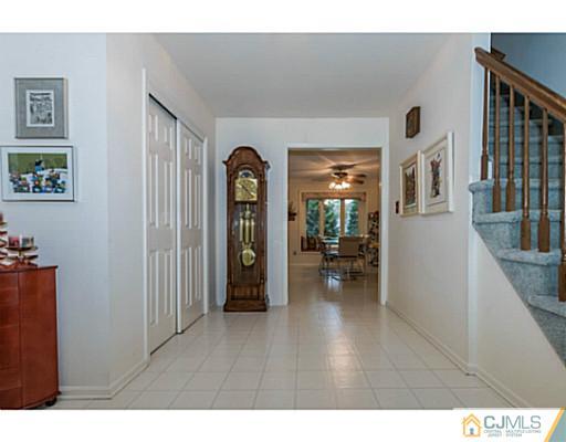 14 Fox Hill Road Edison, NJ 08820 - Photo 2 of 22 a living room with furniture and a wooden floor