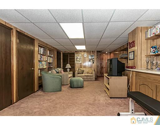 14 Fox Hill Road Edison, NJ 08820 - Photo 15 of 22 a room with furniture and a window
