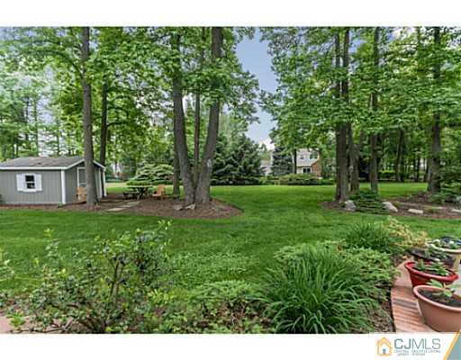 14 Fox Hill Road Edison, NJ 08820 - Photo 18 of 22 a view of a house with a yard