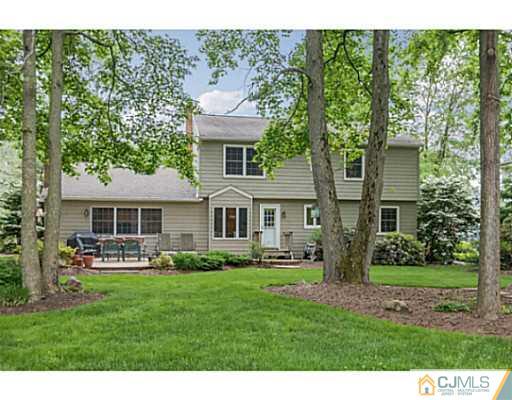 14 Fox Hill Road Edison, NJ 08820 - Photo 19 of 22 a front view of a house with garden