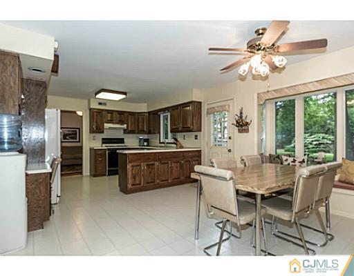 14 Fox Hill Road Edison, NJ 08820 - Photo 6 of 22 a view of a dining room kitchen and a window